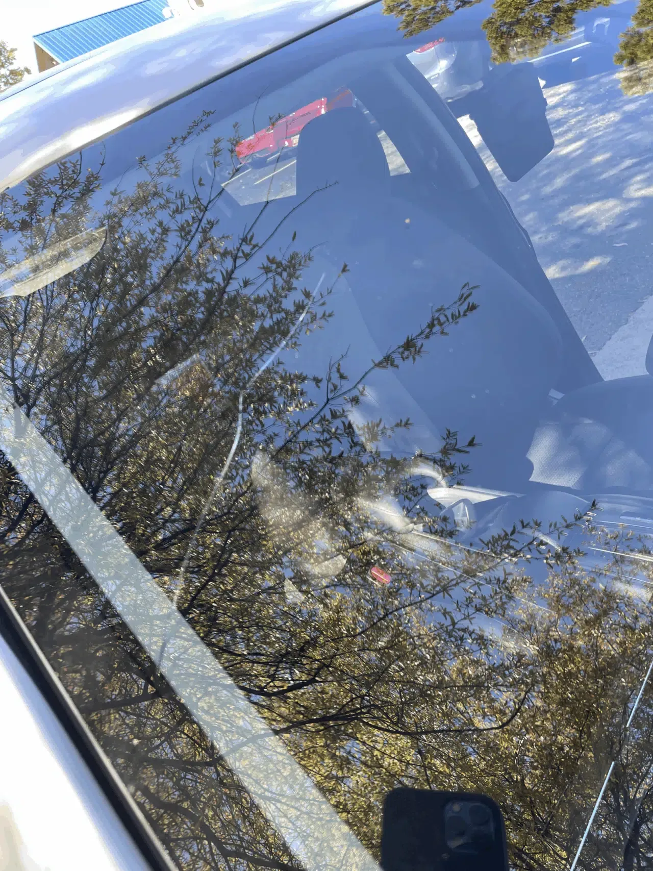 Freshly installed windshield glass on a customer's vehicle