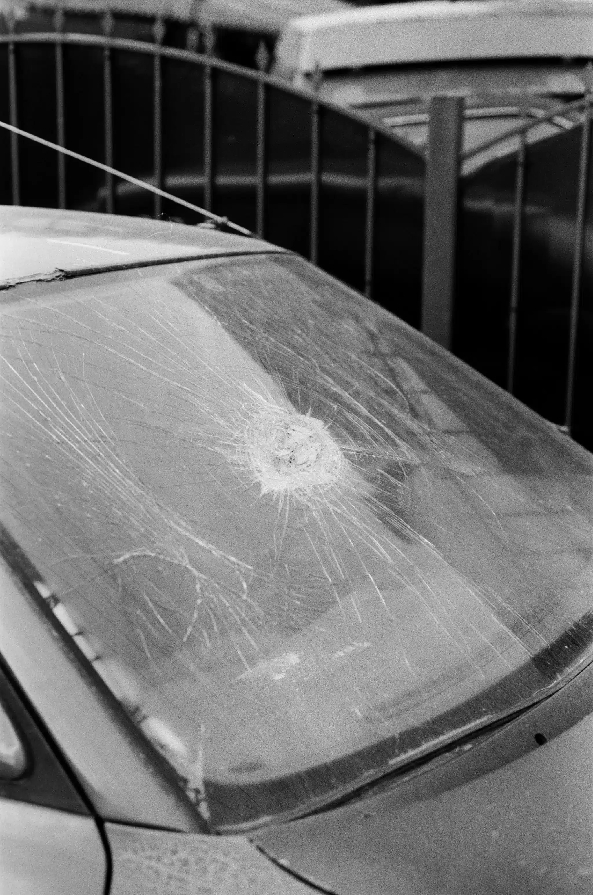 Windshield with a spreading impact crack